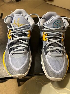 Light Gray Athletic Sneakers with Yellow Accents